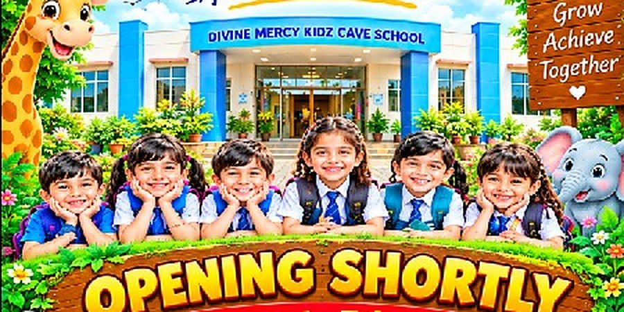 Children in school uniform smiling in front of the Divine Mercy Kidz Cave School building